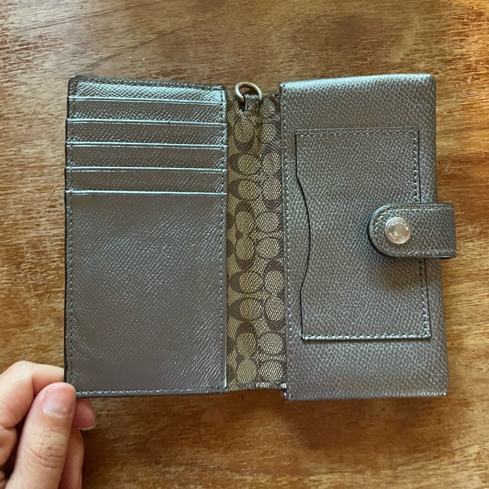 Silver coach wallet